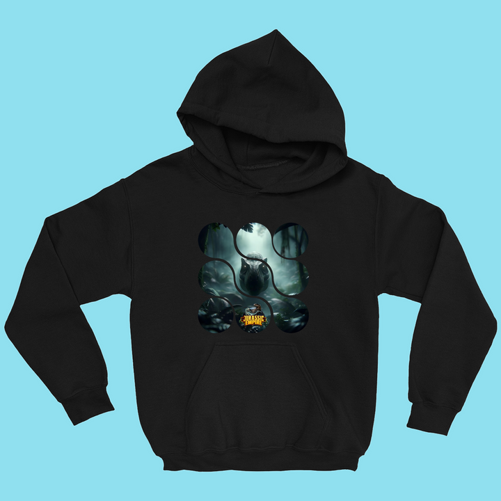 A black Kids Jurassic Empire T-Rex Hoodie by Jurassic Studio, featuring an artistic circular design with a misty forest and a mysterious black cat, plus bold yellow CHAIR lettering, displayed on a light blue background.