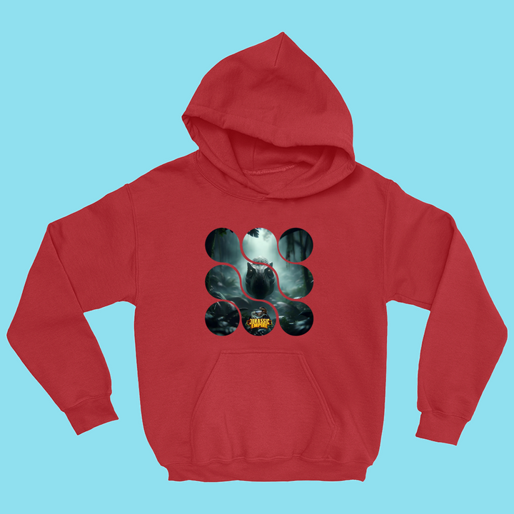 A red hooded sweatshirt from Jurassic Studio, the Kids Jurassic Empire T-Rex Hoodie features circular wolf-and-moon silhouettes with trees and WARM in yellow text on a light blue background, inspired by our collection.