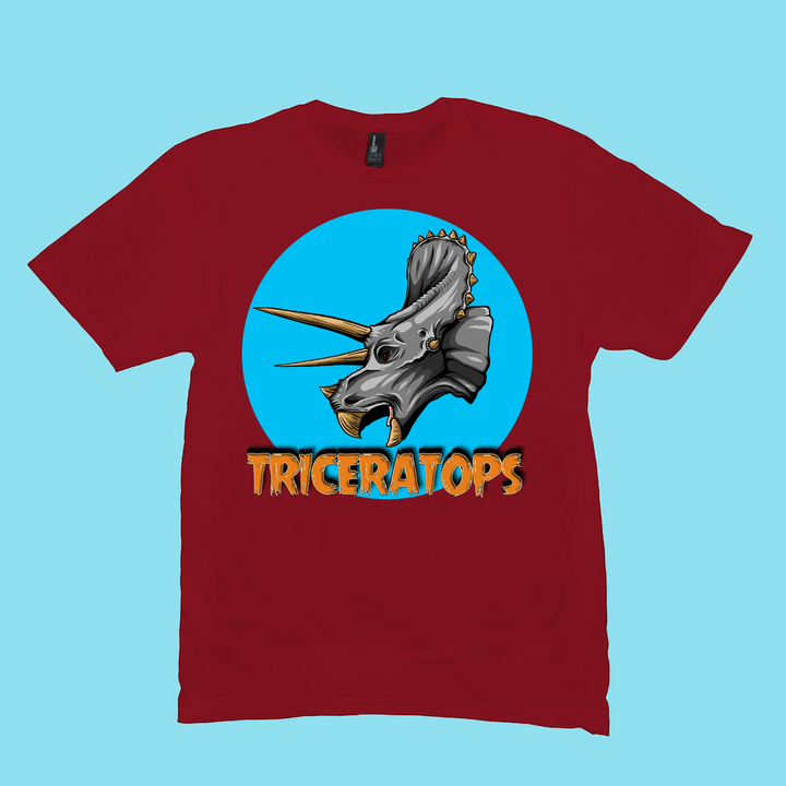 The Men Triceratops Head T-Shirt by Jurassic Studio features a detailed red triceratops head in a blue circle with bold yellow TRICERATOPS—a unique gift for dinosaur fans or a standout mens Jurassic tee.