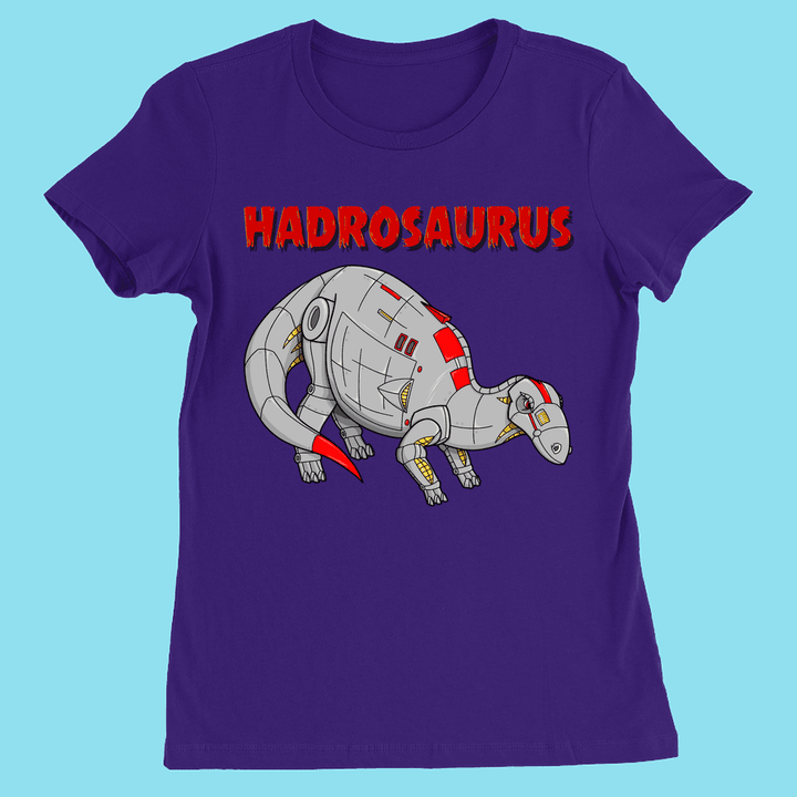 The Jurassic Studio Women Robot Hadrosaur T-Shirt features a cartoon robotic hadrosaurus with red and gray details, bold red HADROSAURUS lettering, and a light blue background—perfect for dinosaur fans.