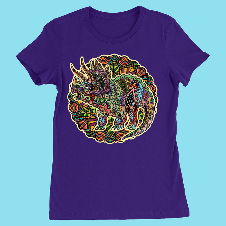 The Women Triceratops Mandala T-Shirt by Jurassic Studio features a colorful triceratops within a vibrant circular design on a light blue background—an exclusive and unique dinosaur gift.