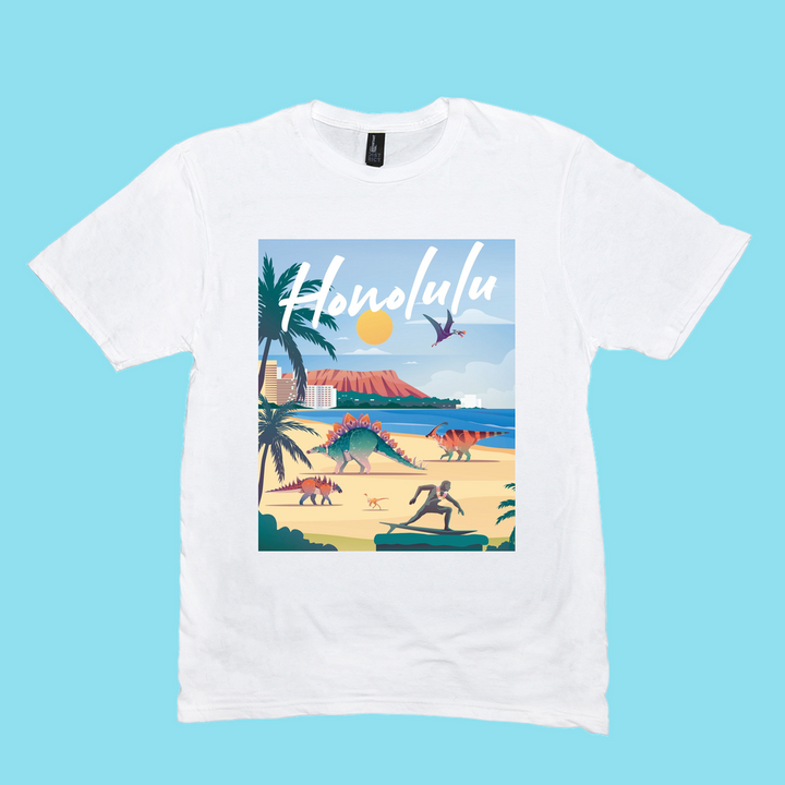 Jurassic Studio’s Men Honolulu T-Shirt is 100% cotton, featuring a vibrant dinosaur and palm tree beach scene with volcano, ocean, surfer, and bold “Honolulu” script—a perfect gift for dinosaur fans.