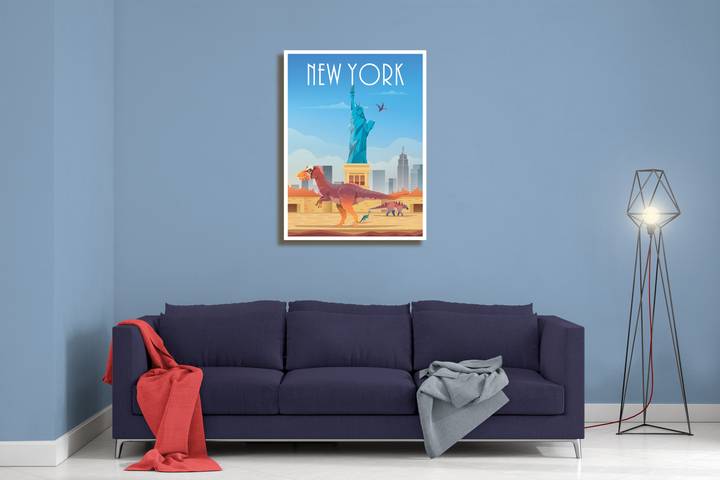 A modern living room features a dark blue sofa with red and gray blankets against a blue wall. Above hangs the Jurassic Studio New York Canvas Wrap, showcasing the Statue of Liberty and a dinosaur. A modern floor lamp stands to the right.