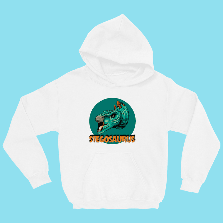 The Kids Stegosaurus Head Hoodie by Jurassic Studio showcases a white hoodie with a colorful cartoon stegosaurus head in a green circle and bold orange STEGOSAURUS text. Perfect for young dino fans! Background is light blue.