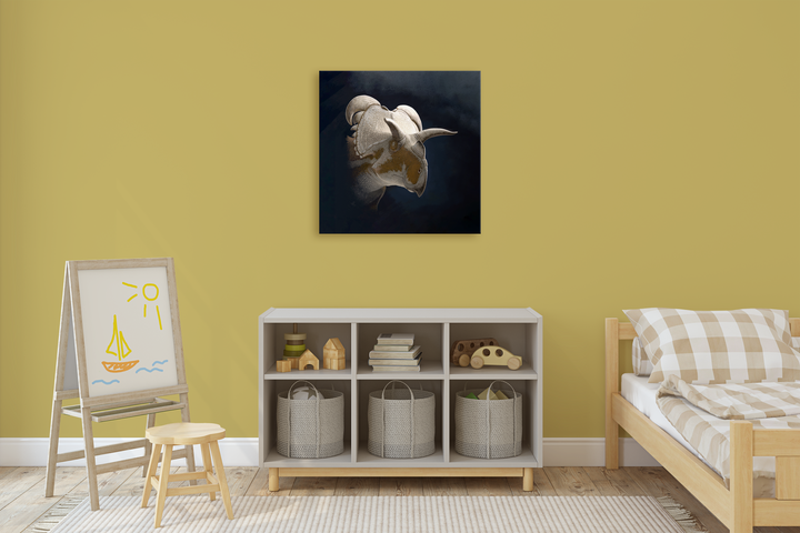 A cozy, modern childs bedroom with yellow walls features a wooden bed, storage unit, easel, and Jurassic Studio’s Medusaceratops Portrait Canvas Wrap displayed next to a painting of a white rhino on the wall.