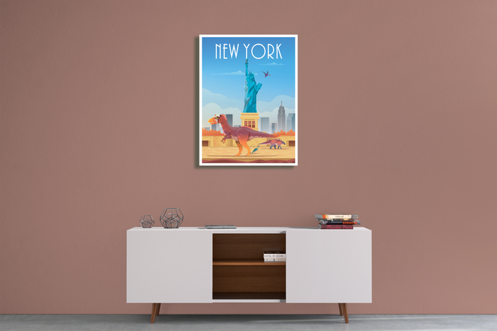 A minimalist living room features the Jurassic Studio New York Canvas Wrap above a white cabinet and brown wall, showcasing the Statue of Liberty, New York skyline, and a dinosaur in the foreground.