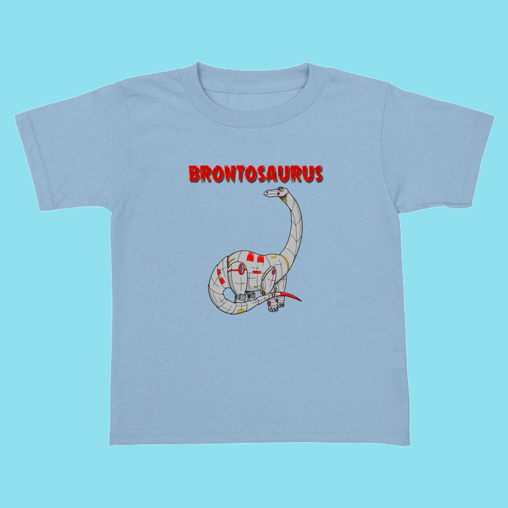 Jurassic Studios Toddler Robot Brontosaurus T-Shirt in light blue features a cartoon robot brontosaurus with bold red BRONTOSAURUS lettering. A fun exclusive, perfect for dinosaur fans!.