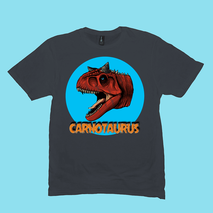 The Men Carnotaurus Head T-Shirt by Jurassic Studio showcases a bold red dino head in a blue circle and orange CARNOTAURUS text on black, set against light blue. An exclusive gift for dinosaur fans!.