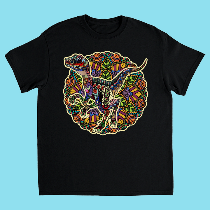 The Kids Velociraptor Mandala T-Shirt from Jurassic Studio features a black tee with a vibrant mandala-style dinosaur design—an ideal unique gift for any young dinosaur fan.