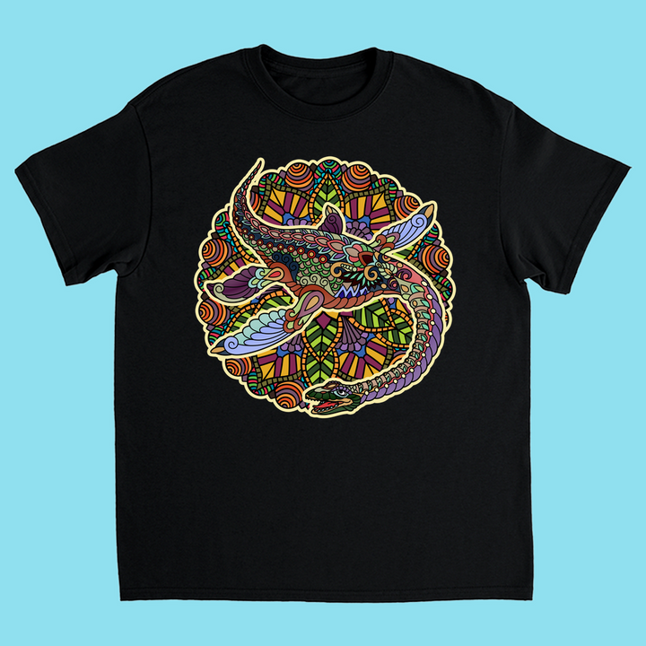 The Kids Plesiosaurus Mandala T-Shirt by Jurassic Studio features a vibrant, intricate dino design with colorful patterns in a circular motif—perfect for any dinosaur fan’s collection. Displayed on a light blue surface.