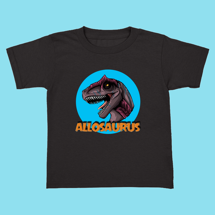 The Toddler Allosaurus Head T-Shirt by Jurassic Studio features a cartoon purple Allosaurus head in a blue circle and bold orange ALLOSAURUS text—an ideal gift for dinosaur fans or any Jurassic Studio collection.