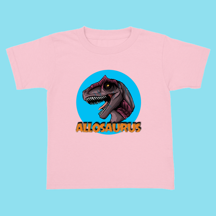 The Toddler Allosaurus Head T-Shirt by Jurassic Studio features a cartoon dinosaur in a blue circle with bold orange ALLOSAURUS text—perfect for dinosaur fans and Jurassic Studio enthusiasts.