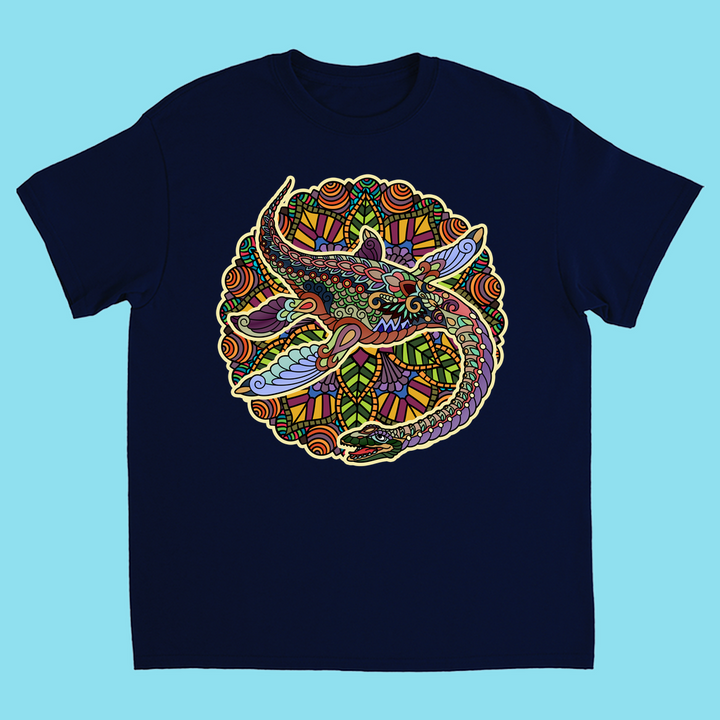 The Kids Plesiosaurus Mandala T-Shirt by Jurassic Studio features a vibrant circular lizard design on navy blue—ideal for dinosaur fans and Jurassic Studio lovers. The bold artwork stands out against a light blue background.