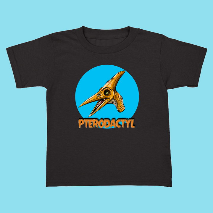 Jurassic Studio’s Toddler Pterodactyl Head T-Shirt features a cartoon pterodactyl head in a blue circle with bold orange PTERODACTYL—an ideal dinosaur-themed gift for toddlers.