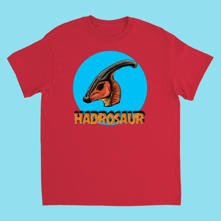 The Kids Hadrosaur Head T-Shirt by Jurassic Studio features an illustrated hadrosaur head on a red shirt with “HADROSAUR” in bold letters—a perfect dinosaur fan gift.