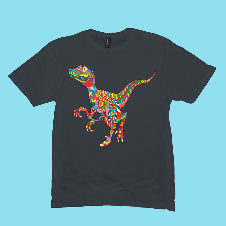 The Jurassic Studio Men Velociraptor Zentangle T-Shirt features a vibrant, folk art-style velociraptor graphic on a black shirt with a light blue background.