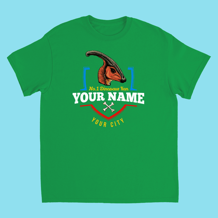 Jurassic Studio’s N.1 Hadrosaur Fan Custom Kids T-shirt features a Parasaurolophus head, No. 1 Dinosaur Fan YOUR NAME YOUR CITY, crossed bones, and a light blue background—a fun personalized dinosaur shirt kids will love!.