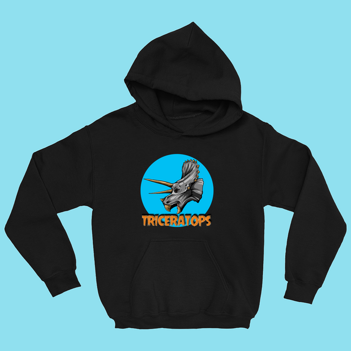 The Kids Triceratops Head Hoodie by Jurassic Studio features a black design with a triceratops head in a blue circle and bold orange TRICERATOPS text, shown on a light blue background.