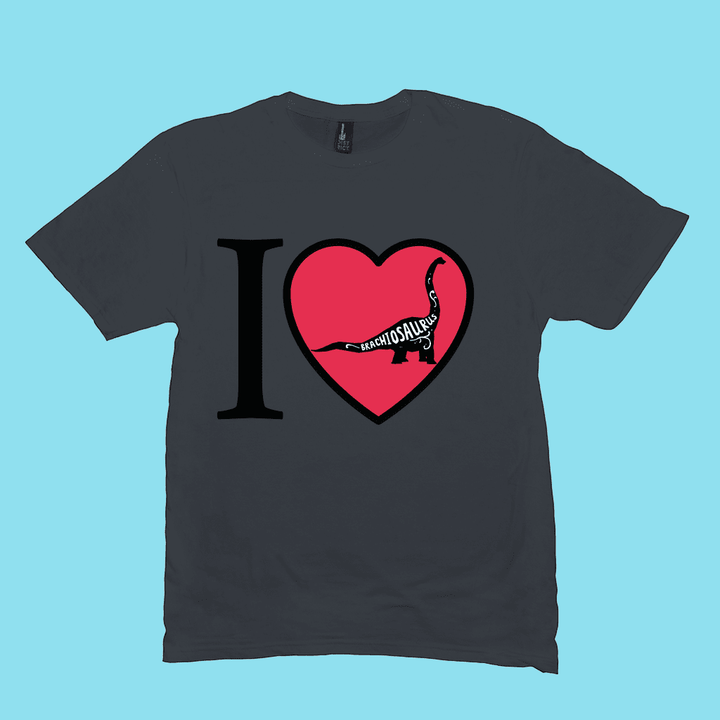 The Men I Love Brachiosaurus T-Shirt by Jurassic Studio features a black design with a red heart, white Brachiosaurus silhouette and name on light blue—making it an ideal gift for dinosaur fans and a Jurassic Studio exclusive.