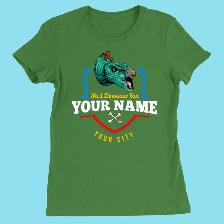 Jurassic Studios N.1 Stegosaurus Fan Custom Women T-Shirt features a slim fit, cartoon stegosaurus head, crossed bones, personalized name and city details—all on a light blue background for a fun custom look.