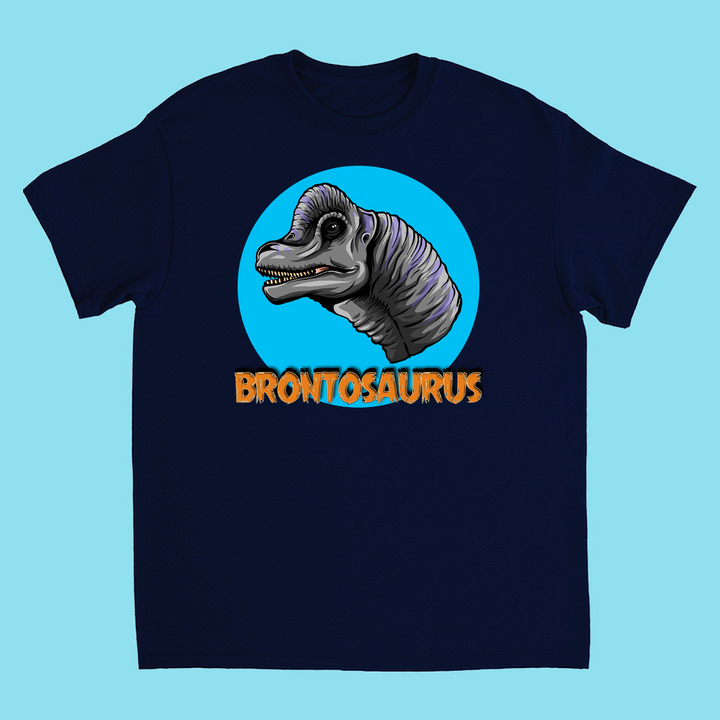 The Kids Brontosaurus Head T-Shirt by Jurassic Studio features a cartoon brontosaurus head in a blue circle with BRONTOSAURUS in bold orange—an exclusive gift for young dinosaur fans.