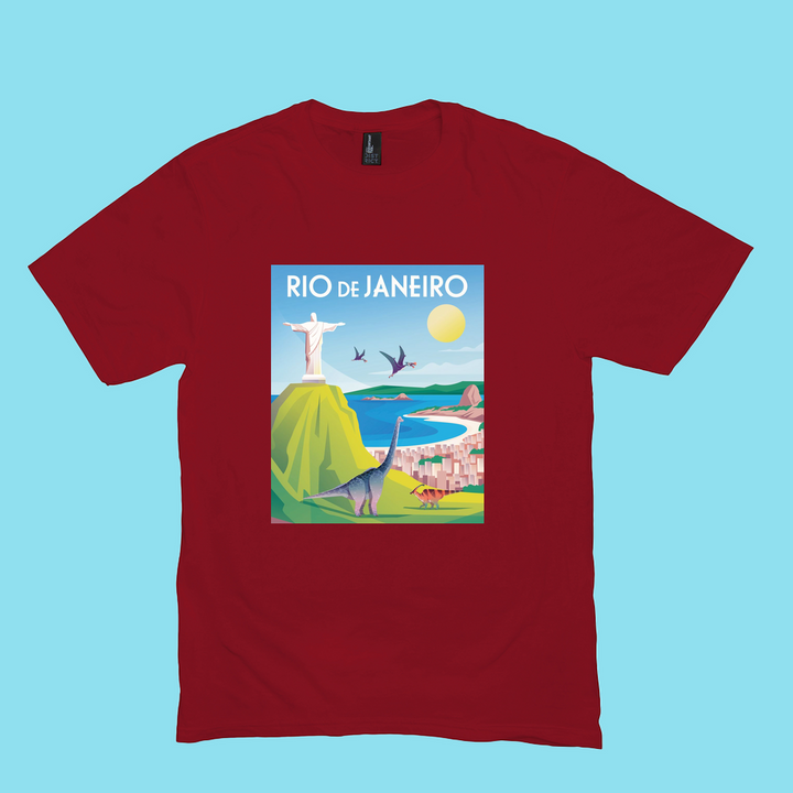 The Men Rio de Janeiro T-Shirt by Jurassic Studio features a colorful postcard of Rio with Christ the Redeemer, beaches, dinosaurs, pterodactyls, and a bright sun—perfect for dinosaur fans or as a unique Jurassic Studio exclusive!.
