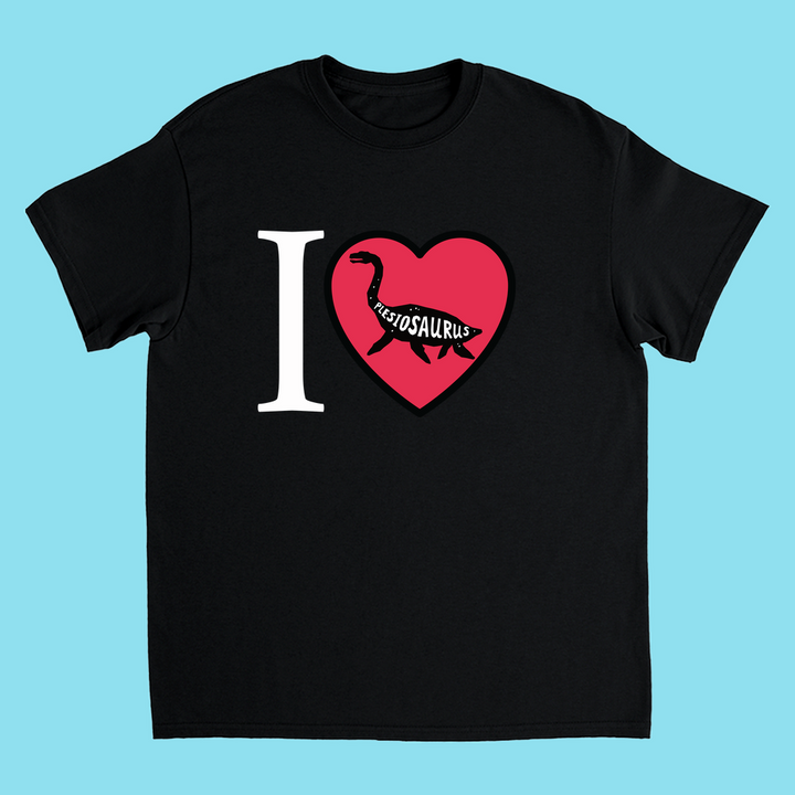 The Kids I Love Plesiosaurus T-Shirt by Jurassic Studio features a black tee with I ♥ Plesiosaurus and a heart-shaped plesiosaurus silhouette on light blue—a great gift for dinosaur fans.