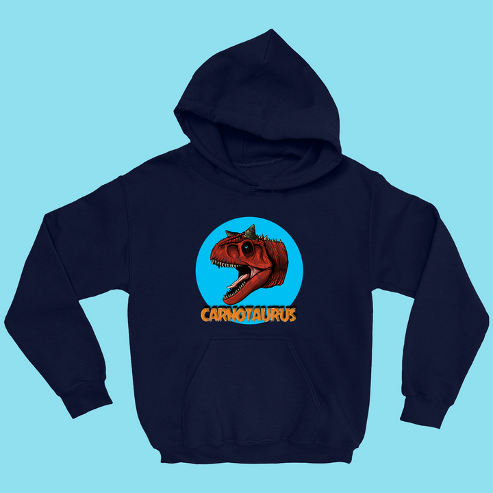 The Kids Carnotaurus Head Hoodie by Jurassic Studio features a bold red Carnotaurus head in a blue circle on a light blue background, with CARNOTAURUS in orange below—a fun exclusive for dinosaur fans.