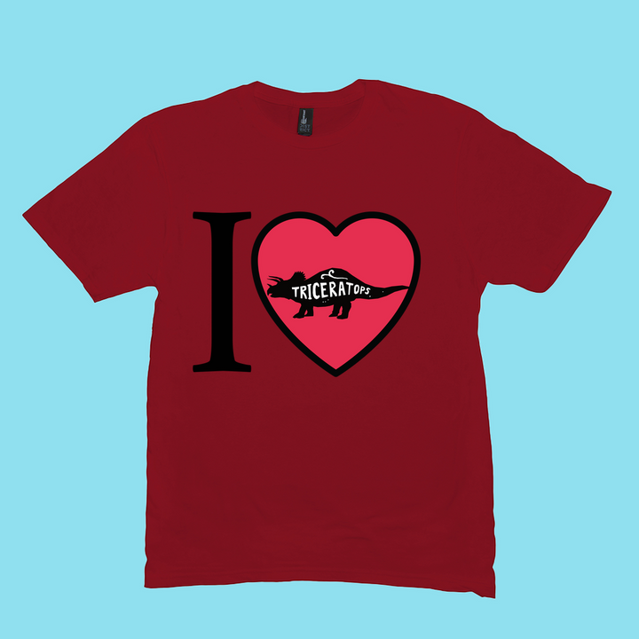 Show your dino love with the Men I Love Triceratops T-Shirt from Jurassic Studio, featuring a bold black I, red heart outline with triceratops silhouette, and TRICERATOPS text—ideal gift for dinosaur fans.