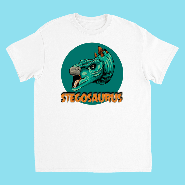 Jurassic Studio’s Kids Stegosaurus Head T-Shirt features a bright cartoon stegosaurus head in a green circle with bold orange cracked “STEGOSAURUS” lettering—ideal as a gift for dinosaur fans.
