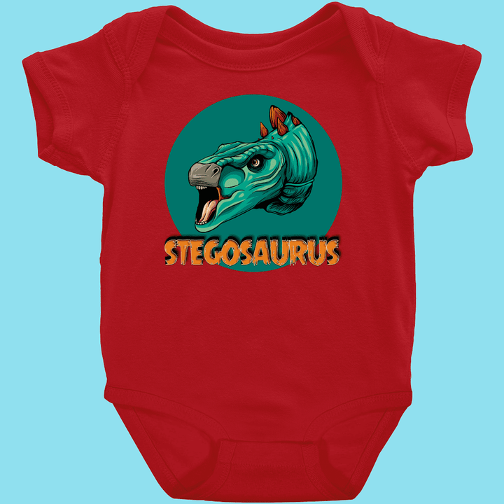 The Toddler Stegosaurus Head Onesie by Jurassic Studio shows a colorful cartoon dino above bold orange text on a teal circle—a cute baby dinosaur outfit perfect for little fans.