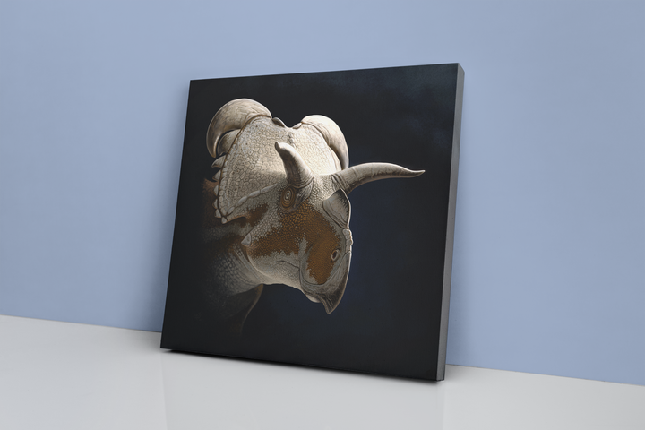 The Jurassic Studio Medusaceratops Portrait Canvas Wrap features a realistic horned dinosaur illustration on a dark background, displayed against a pale blue wall on a white surface.