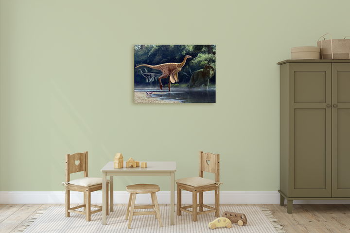 A childrens playroom with a small table, two chairs, wooden toys, and a Jurassic Studio Rativates Canvas Wrap on the pale green wall above the table. A green wardrobe and woven baskets are on the right.
