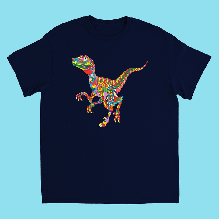 The Kids Velociraptor Zentangle T-Shirt by Jurassic Studio features a vibrant, patterned Velociraptor on navy blue—an exclusive, perfect gift for young dinosaur fans.