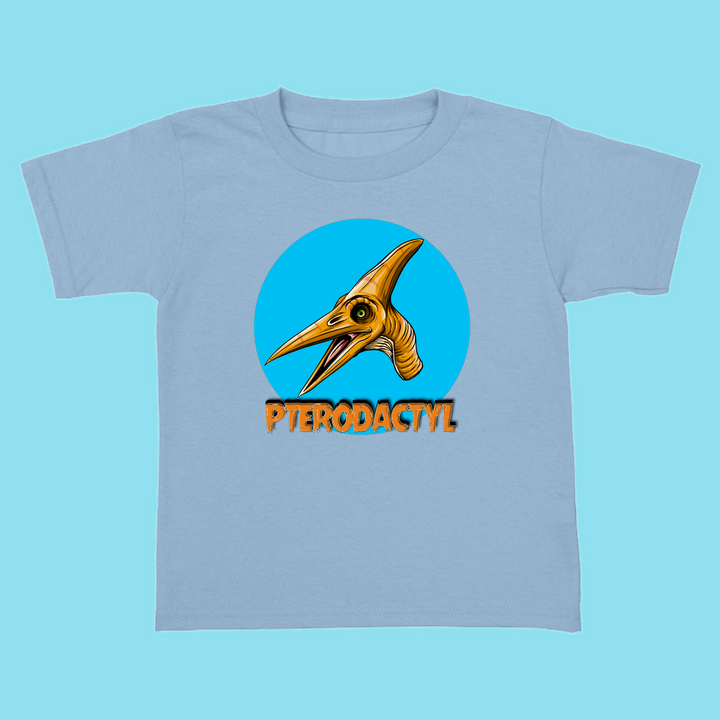 Jurassic Studio Toddler Pterodactyl Head T-Shirt in light blue features a cartoon yellow pterodactyl in a blue circle with bold orange “PTERODACTYL”—a perfect gift for dinosaur fans!.