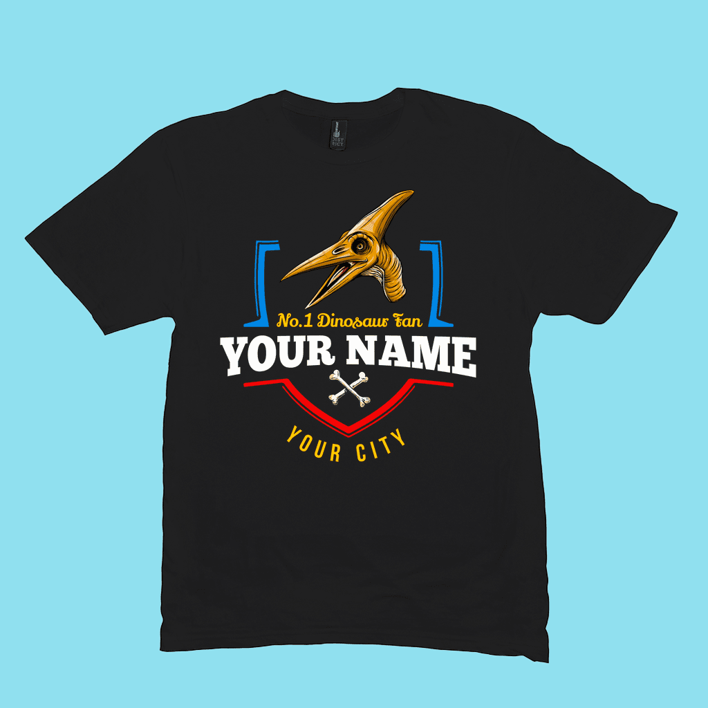 Jurassic Studios N.1 Pterodactyl Fan Custom Men T-Shirt features a yellow pterodactyl, No.1 Dinosaur fan YOUR NAME YOUR CITY, and two white bones on black—exclusive personalized dinosaur design.