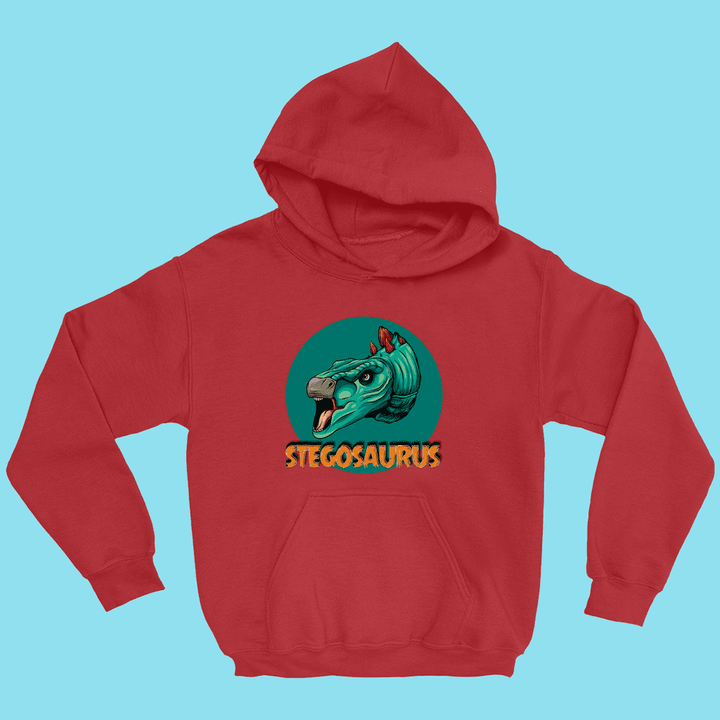 Jurassic Studio’s Kids Stegosaurus Head Hoodie features an illustrated blue-green dino head and bold yellow STEGOSAURUS text on red—perfect for young dinosaur fans.