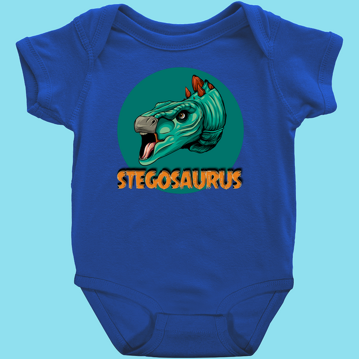 Dress your little one in the Jurassic Studio Toddler Stegosaurus Head Onesie, featuring a green stegosaurus head with an open mouth inside a green circle and bold orange “STEGOSAURUS”—the perfect baby dinosaur outfit!.