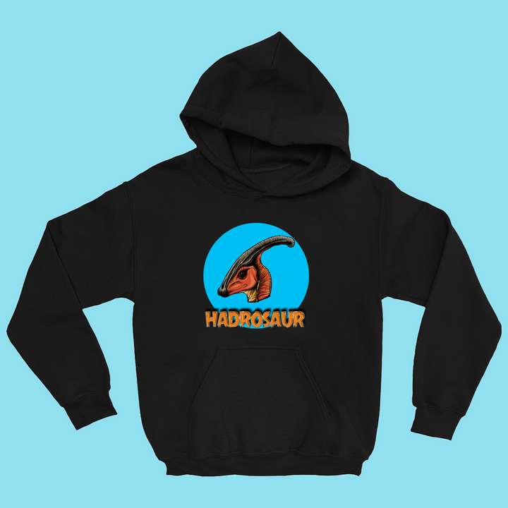The Jurassic Studio Kids Hadrosaur Head Hoodie features a colorful hadrosaur head inside a blue circle with bold orange HADROSAUR text below, perfect for young dino fans. Displayed on a light blue background.