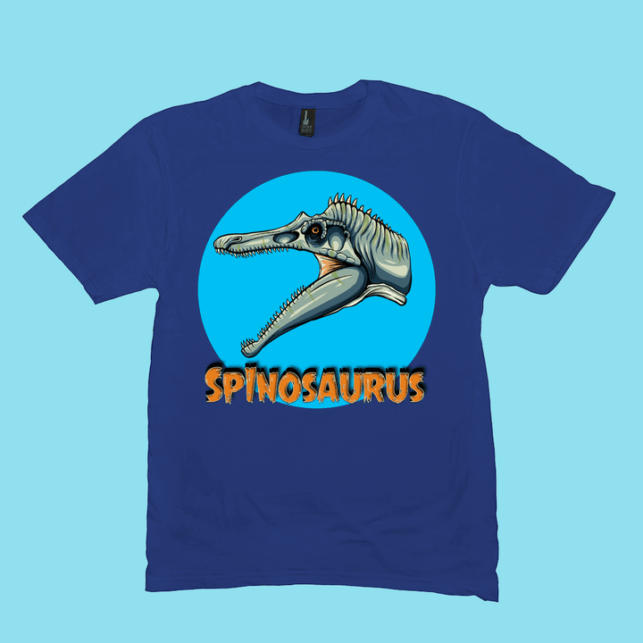 The Men Spinosaurus Head T-Shirt by Jurassic Studio features a dinosaur graphic in a blue circle and bold orange SPINOSAURUS text. This exclusive tee makes the perfect gift for dinosaur fans.