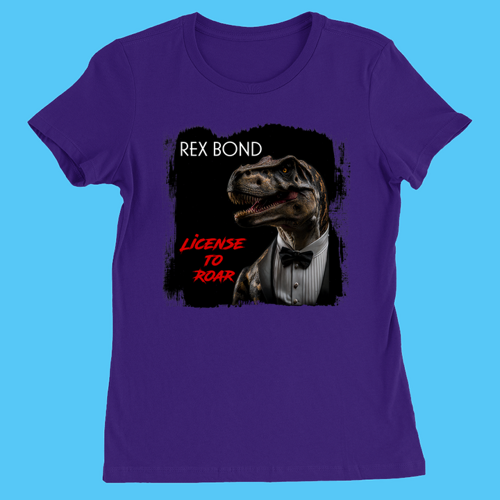 The Women Rex Bond T-Shirt by Jurassic Studio features a purple tee with a tuxedo-clad T. rex, REX BOND above, LICENSE TO ROAR below, and a black paint-effect backdrop—an exclusive gift for dinosaur fans.