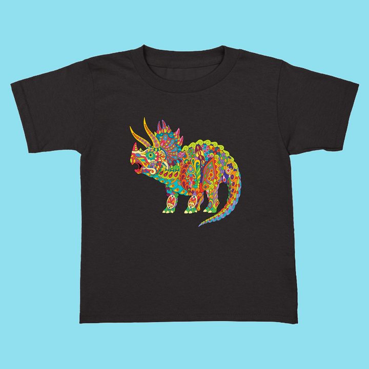 The Toddler Triceratops Zentangle T-Shirt by Jurassic Studio features a colorful folk art triceratops on a black tee—an exclusive gift for dinosaur fans, shown against a light blue background.