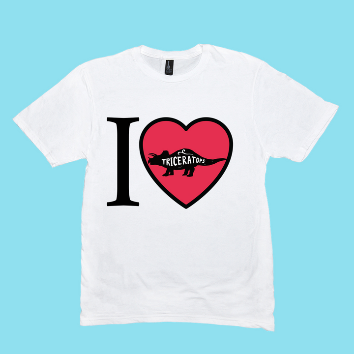The Jurassic Studio Men I Love Triceratops T-Shirt features a bold black I, red heart, and triceratops silhouette on a light blue background—an ideal gift for dinosaur fans.