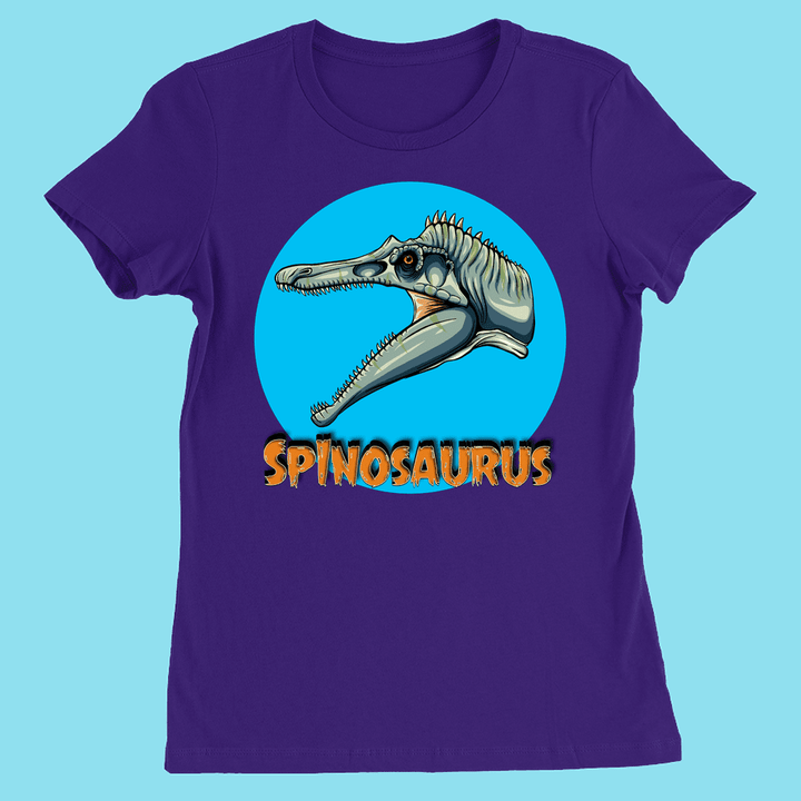 The Women Spinosaurus Head T-Shirt from Jurassic Studio features a purple design with a Spinosaurus head in a blue circle and bold orange lettering—perfect for dinosaur fans and available exclusively at Jurassic Studio.