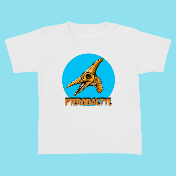 The Jurassic Studio Toddler Pterodactyl Head T-Shirt features a white tee with a cartoon orange pterodactyl head in a blue circle and bold orange PTERODACTYL text. Great gift for dinosaur fans! Light blue background.