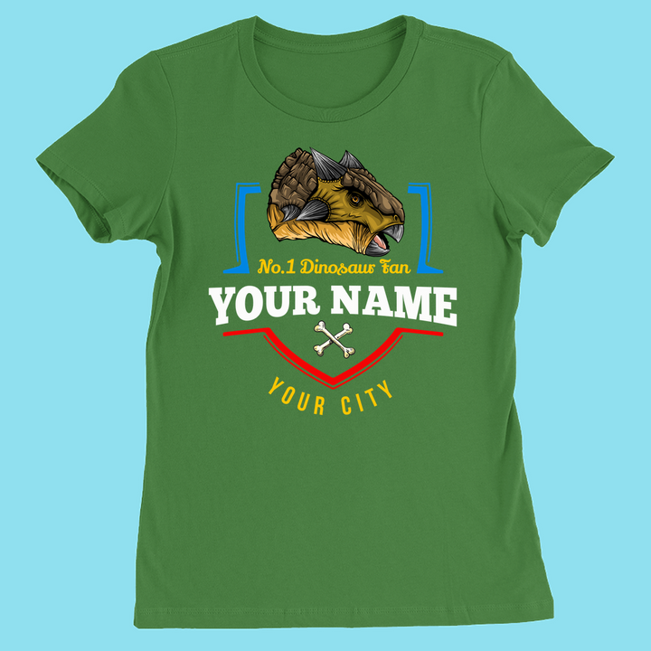 Jurassic Studio’s N.1 Ankylosaurus Fan custom women’s T-shirt features an ankylosaurus, “No.1 Dinosaur Fan,” your name and city, with two crossed bones—on light blue. A fun, personalized dinosaur shirt!.
