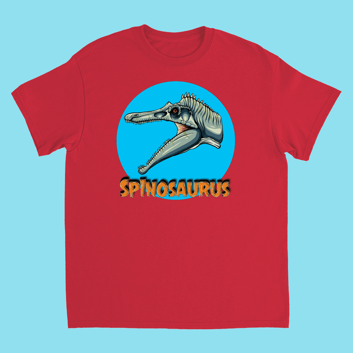 The Kids Spinosaurus Head T-Shirt by Jurassic Studio features an illustrated Spinosaurus head in a blue circle with Spinosaurus in bold yellow-orange letters below—a vibrant dinosaur shirt for kids.