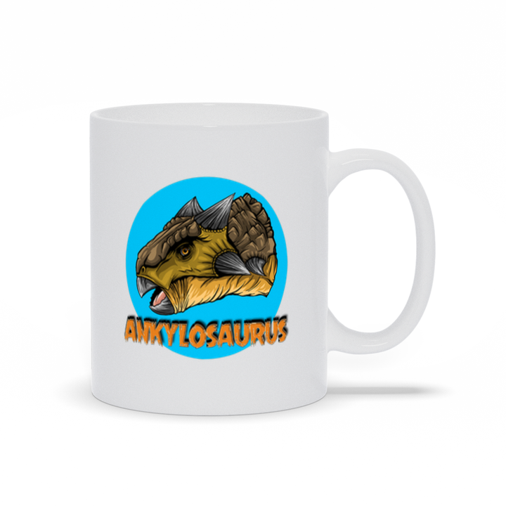 The Ankylosaurus Portrait Mug by Jurassic Studio features a white ceramic design with an illustrated ankylosaurus head in a blue circle and bold orange “ANKYLOSAURUS” text—perfect for any dinosaur enthusiast!.